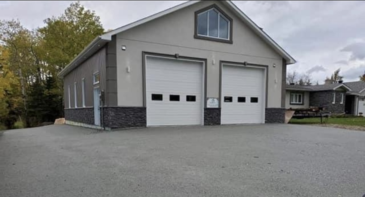 Clear Cut Glass And Aluminum storefront and work area
